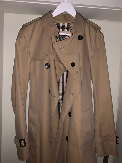 Should you size up or down for trench coat?