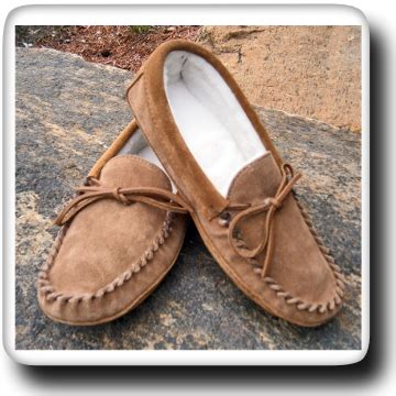 How should new moccasins fit?