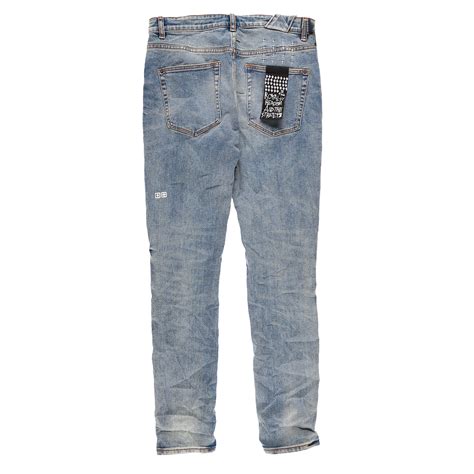 What is the brown tag on jeans for?